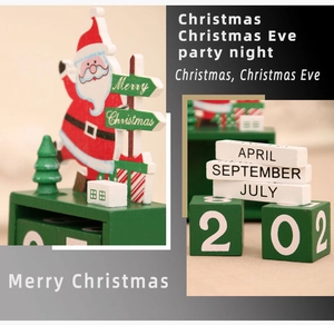 Detail of wooden Christmas countdown calendar with Santa Claus figurine and date blocks