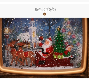 Close-up of retro TV Christmas snow globe showing Santa, reindeer, and golden glitter