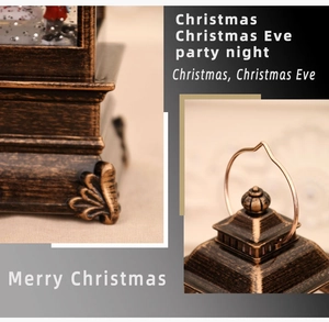 Detail of vintage bronze Christmas lantern with embossed base and metal hanging ring