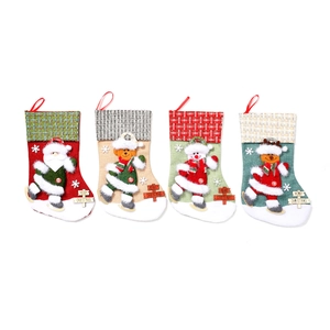 Set of four large velvet Christmas stockings with cartoon 3D Santa and reindeer designs