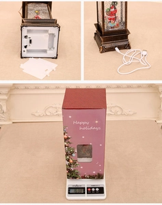 Detail of Christmas lantern showing dual battery and USB power modes with gift box packaging