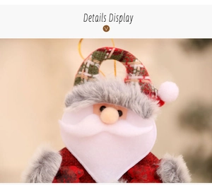 Detail of plush Santa Claus ornament with red plaid fabric and golden hanging cord
