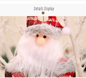 Detail showing plush Santa Claus ornament with red plaid hat and grey faux fur texture