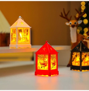 Three-color LED Christmas lanterns with festive Santa and reindeer paintings in warm light