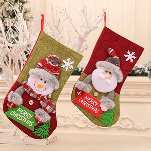 Rustic burlap Christmas stockings set with Santa and Snowman motifs for fireplace decor