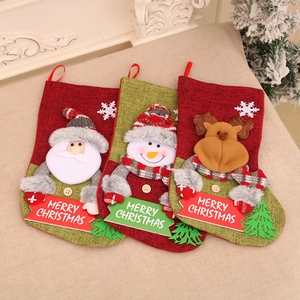 Set of three large Christmas stockings with 3D Santa, Snowman, and Reindeer plush designs