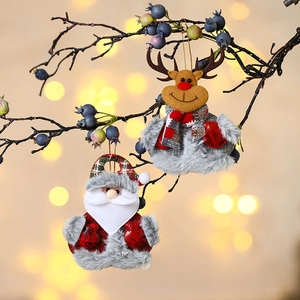 Handmade plush Santa and reindeer Christmas tree ornaments with festive gold hanging strings