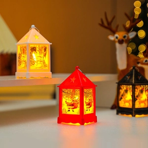 Luminous Christmas lanterns set in red white and bronze with festive deer and Santa prints