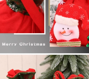 Detail of red Christmas drawstring gift bag with 3D snowman, plush trim and snowflake embroidery