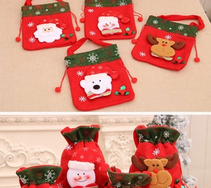 Detail of 3D Christmas drawstring gift bags with Santa, Snowman and Reindeer designs
