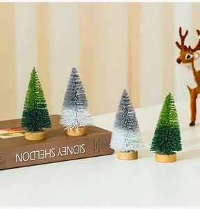 Detailed view of 10cm mini glitter cedar trees with natural wooden bases for Christmas decor