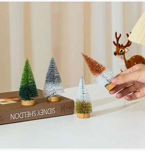 Set of four 10cm mini cedar Christmas trees with glitter powder and wooden bases