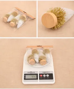 Mini cedar trees detail with wooden bases and golden-white bristles for Christmas decor