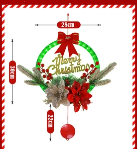 Lighted Christmas wreath detail with red berries pine needles and Merry Christmas sign