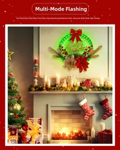 Illuminated Christmas wreath with red flowers and golden Merry Christmas sign over fireplace