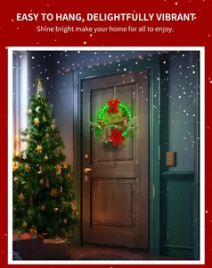 Luminous Christmas wreath with red bow and Merry Christmas sign on dark wooden door