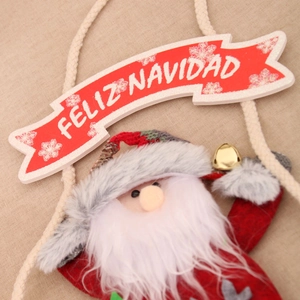 Λήψη macro υφασμάτινου Άγιου Βασίλη με κείμενο Feliz Navidad σε λινό φόντο