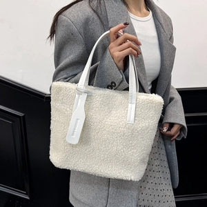 White faux fur lamb hair tote bag with fashion tag for women in autumn and winter