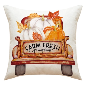 Detail of linen pillowcase featuring a vintage truck with autumn pumpkins and foliage