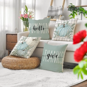 Set of 4 linen Thanksgiving pillow covers featuring blue pumpkins and seasonal text