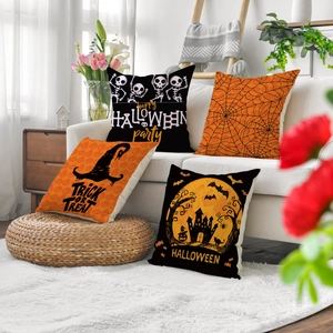 Set of four Halloween linen pillow covers with ghosts, skeletons and spider web patterns
