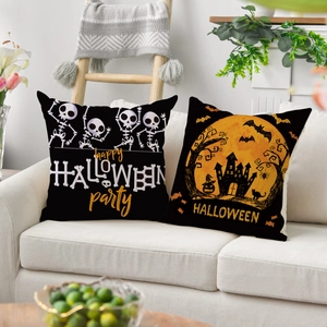 Set of 2 black Halloween linen pillow covers featuring dancing skeletons and pumpkin patterns