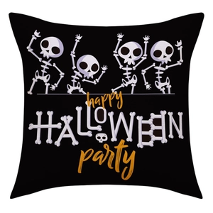 Macro view of Halloween linen pillowcase featuring four white cartoon skeletons and party text