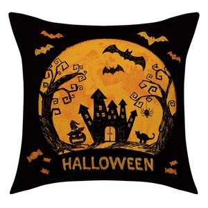 Detailed view of Halloween linen pillowcase with black castle, orange moon and pumpkin graphics