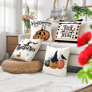 4er-Set Halloween-Leinenkissenbezüge mit Kürbis- und Geist-Drucken auf einem Sofa