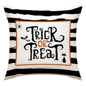 Detail eines Halloween-Kissenbezugs aus Leinen mit Trick or Treat Text und Katzenprint