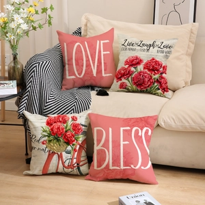 Floral Mother's Day pillow covers set of 4 with Love Bless text on a cozy sofa