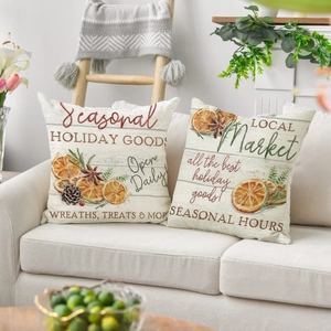 Christmas farmhouse linen pillows with rustic orange and greenery print for sofa decor