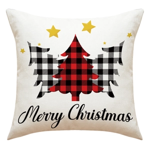 Macro shot of linen texture on Christmas pillowcase with buffalo plaid tree printing