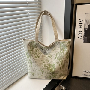 Large capacity tote bag with green bamboo leaf print for women commute and casual use