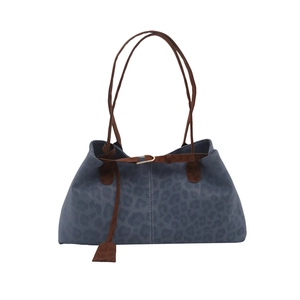 Retro blue leopard print tote bag with brown leather handles and decorative belt strap