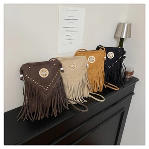 Bohemian suede crossbody bags with tassels and golden rivets in four assorted colors