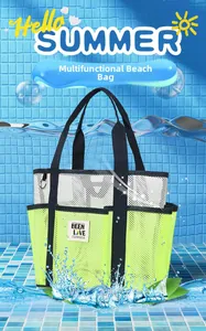 Mesh beach tote bag with reinforced black handles and vibrant green contrast panels