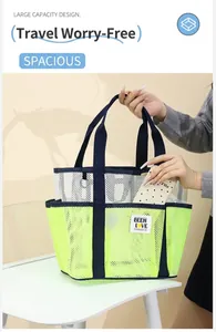 Detailed shot of large capacity mesh beach bag showing a phone pocket and blue strap