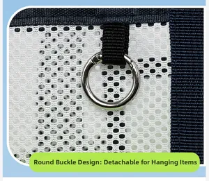 Detail of detachable silver metal ring buckle on mesh travel bag for hanging items