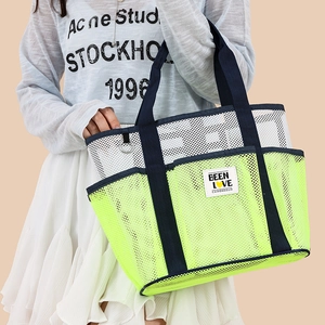 Large mesh beach tote bag in neon green with blue straps for swimming and fitness gear
