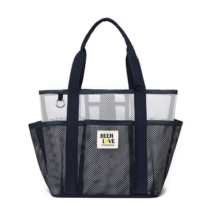 Navy mesh beach tote bag with multiple pockets and durable shoulder straps