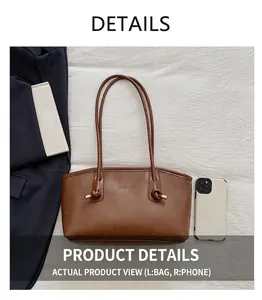 Detail view of large brown tote bag showing smooth leather texture and metal-tipped drawstring