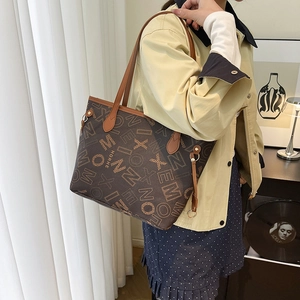 Brown large capacity tote bag with letter prints for women, minimalist indoor setting