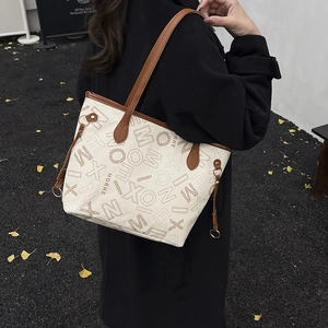 High-capacity tote bag with brown letter print and adjustable leather shoulder straps