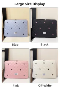 Custodia per laptop trapuntata con ricami a fiocco e doppia cerniera in quattro colori