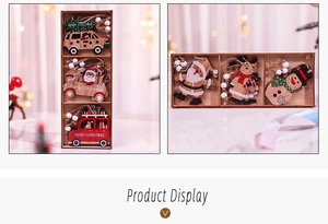 Detail of wooden Christmas ornaments including Santa and cars in a gift box packaging