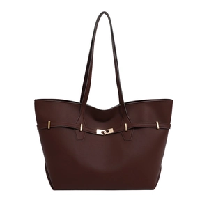Vintage large capacity dark brown tote bag with gold hardware on white background