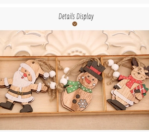 Detailed view of layered wooden Christmas ornaments featuring Santa, snowman and reindeer