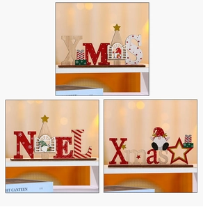 Detailed view of three festive wooden Christmas tabletop signs with gnome and star motifs