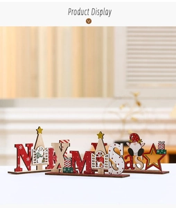 Three DIY wooden Christmas table signs featuring NOEL and XMAS with Santa motifs